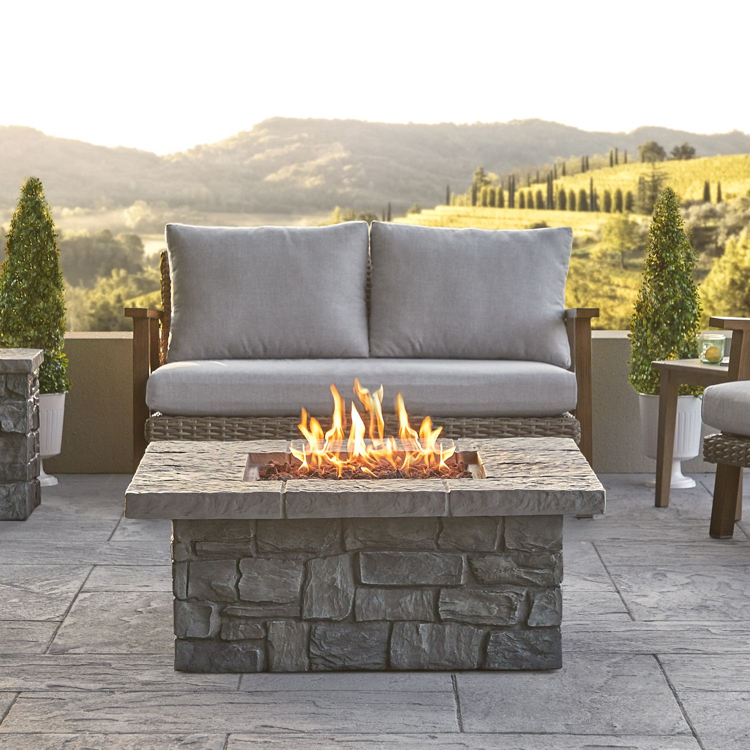 Exploring the Design and Functionality of Faux Stone Fire Pit Tables