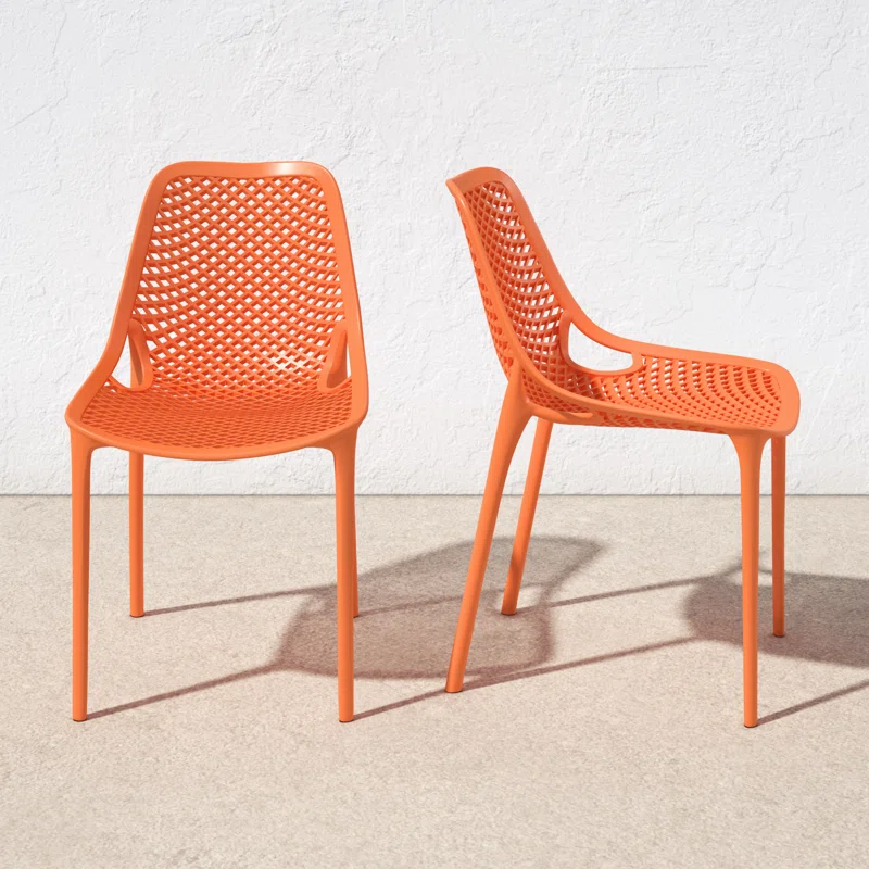 Allmodern + Farrah Stacking Patio Dining Chair pertaining to The hidden versatility of stackable outdoor dining chairs in modern homes
